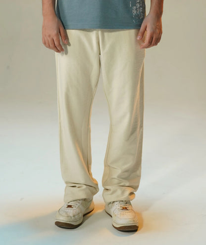 The Relaxed Cream Trouser